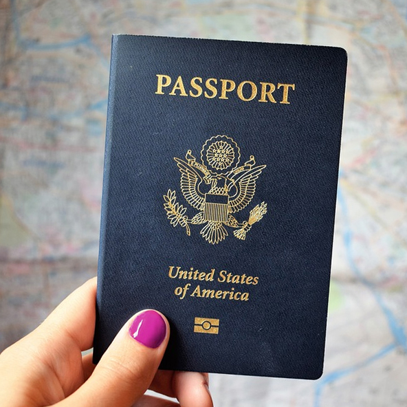 Passport held in hand